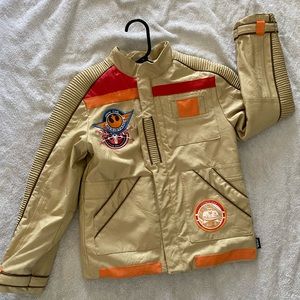 Disney’s Star Wars Finn soft faux leather beige with orange trim decor in 7/8.